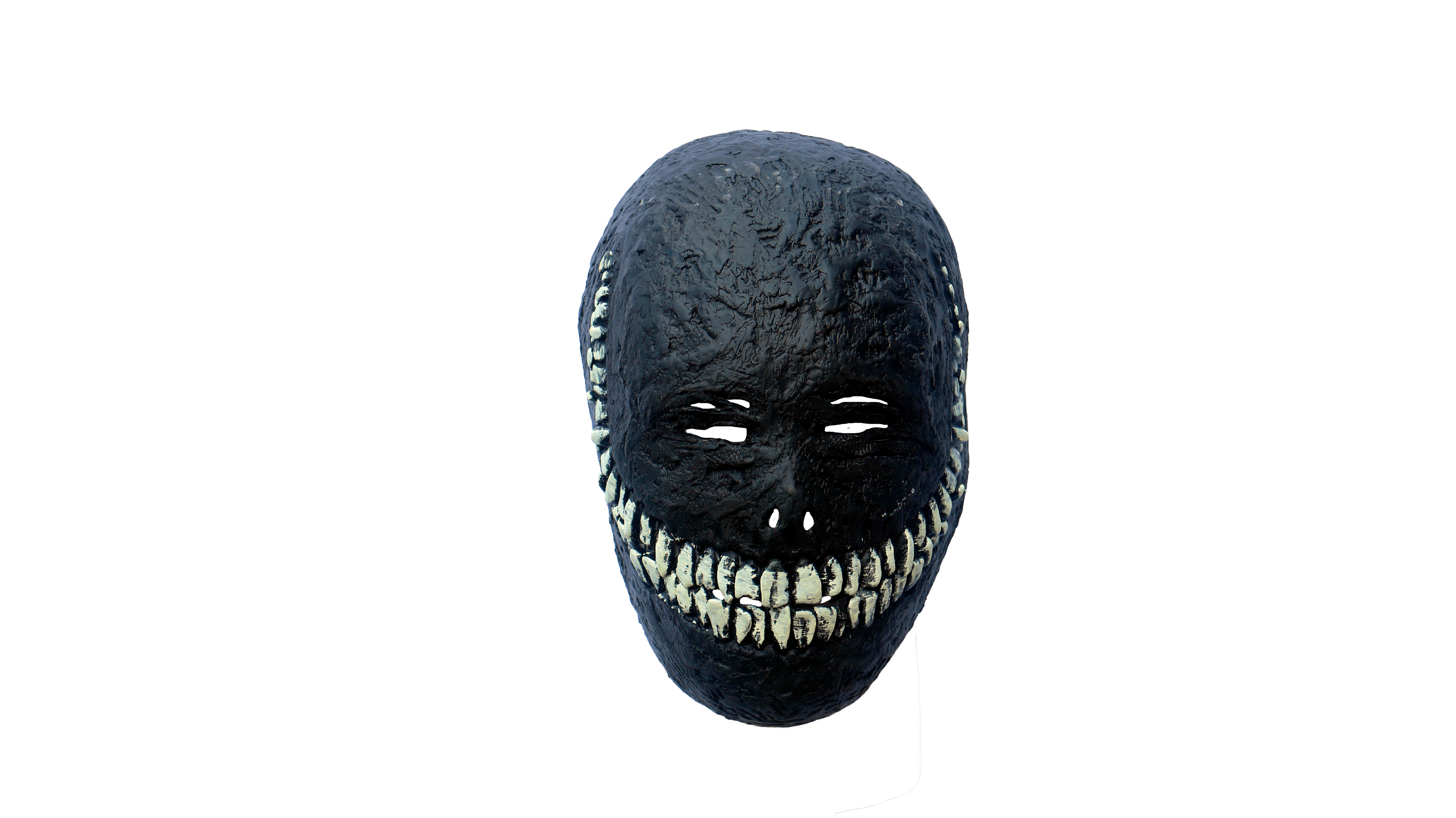 creepy grinning mask